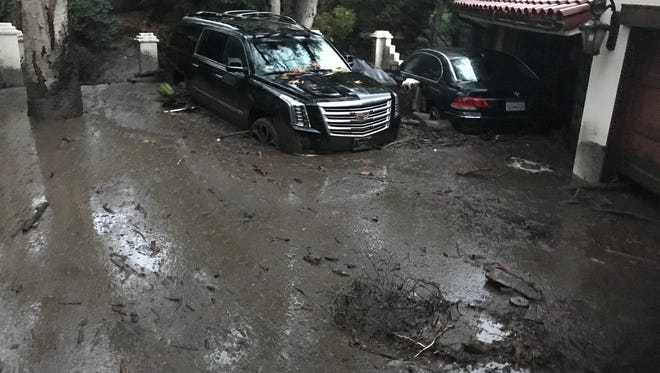 Mud had swept into Janice Graham's and Diana Bow's Montecito property early Tuesday.