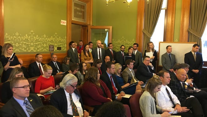 An Iowa Senate committee room was jammed with lobbyists, legislative staffers and others Thursday as an Iowa Senate subcommittee advanced a Senate GOP tax relief package on a 3-2 vote with all Republicans in support and both Democrats opposed.