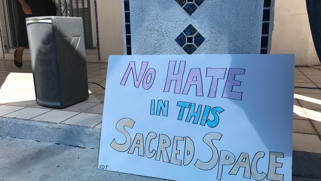 A sign showing support for the Islamic Community Center of Tempe on March 17, 2018.