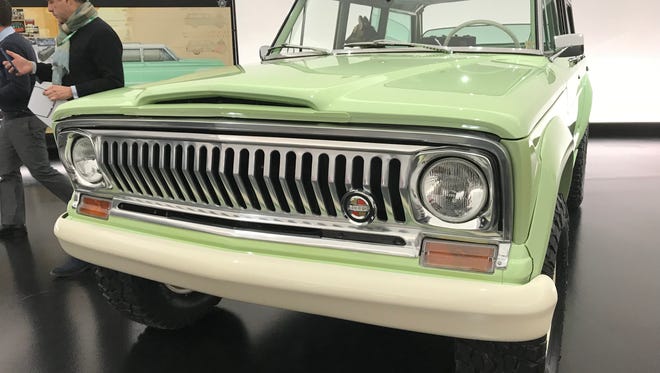 Fiat Chrysler created a color they call “Mintage” to coat this redone 1965 Jeep Wagoneer made for off-roading.