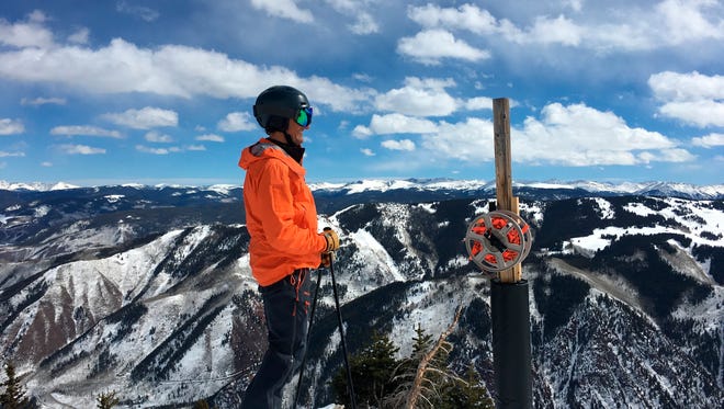 In this March 4, 2018 photo, Aspen Skiing Co. CEO Mike Kaplan poses at Aspen Highlands in Aspen, Colo.  Kaplan and his company have come a long way in their activism, stepping, purposefully, into the spotlight on testy issues and becoming arguably the most politically active of Colorado's large outdoor industry businesses. The resort now champions some of the nation's most divisive topics, from immigration to climate change and LGBTQ rights.   (Jesse Paul/The Denver Post via AP)