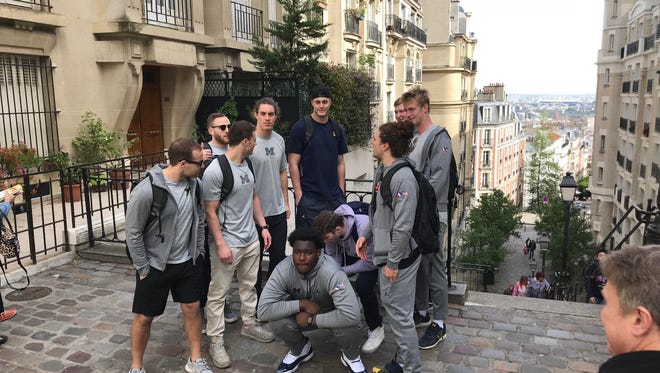 Michigan players pose for a photo atop Montmartre in Paris on Tuesday, May 1, 2018.