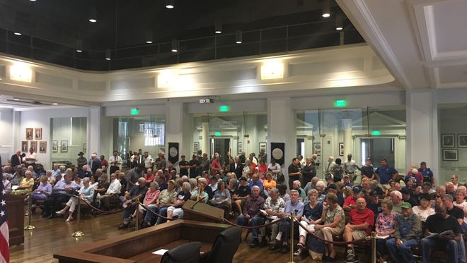 Retirees packed the City Council auditorium on July 17, 2018, to challenge changes to their retirement plans.