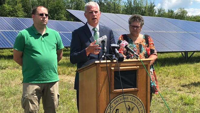 Broome County Executive Jason Garnar announces the newly online solar panels in Conklin.