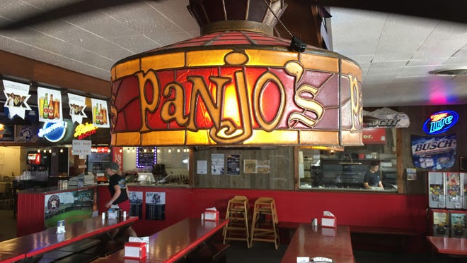 Panjo's Pizza in Gulfway Shopping Center still uses the original light fixtures when the restaurant opened in 1964.