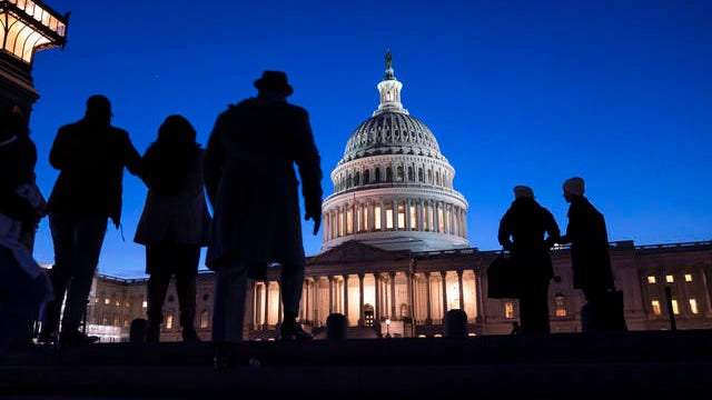 In this Jan. 22 file photo, night falls on the Capitol, in Washington during the impeachment trial of President Donald Trump. For all the gravity of a presidential impeachment trial, Americans don't seem to be giving it much weight. Web traffic and TV ratings tell a similar story, with public interest seeming to flag after the House voted last month to impeach a president for only the third time in U.S. history.