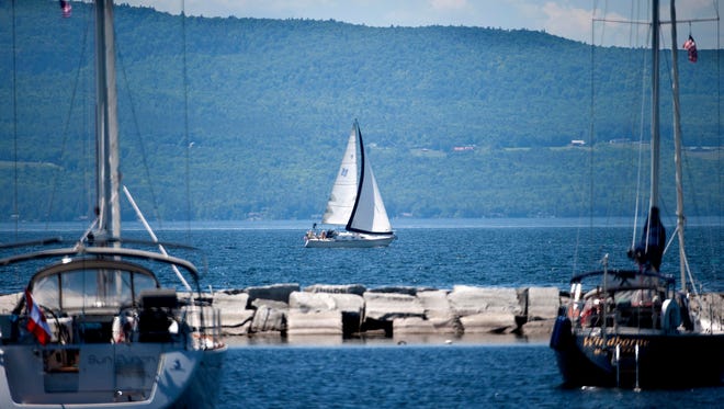 A sailboat plies the waters of Lake Champlain near Burlington on Friday, June 17, 2016.