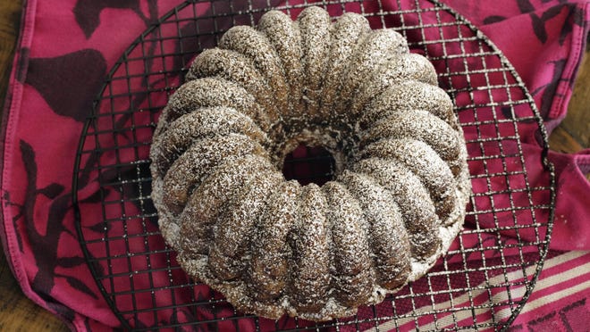 Apple cake baked in a Bundt pan, styled by Sarah Abrams, is displayed at the Institute of Culinary Education in New York.