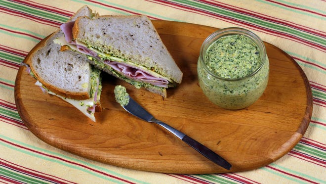 A ham and Swiss on rye with Green Genie sandwich spread might be the best sandwich you’ve had in a while. The spread is also good on crackers or eggs. Turn to page 4D for the recipe. Richard Drew/AP/Styled by Sarah Abrams