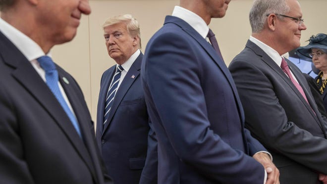President Donald Trump, second left, attends the National Commemorative Event commemorating the 75th anniversary of D-Day, in Portsmouth, England, Wednesday June 5, 2019. (Jack Hill/Pool via AP)