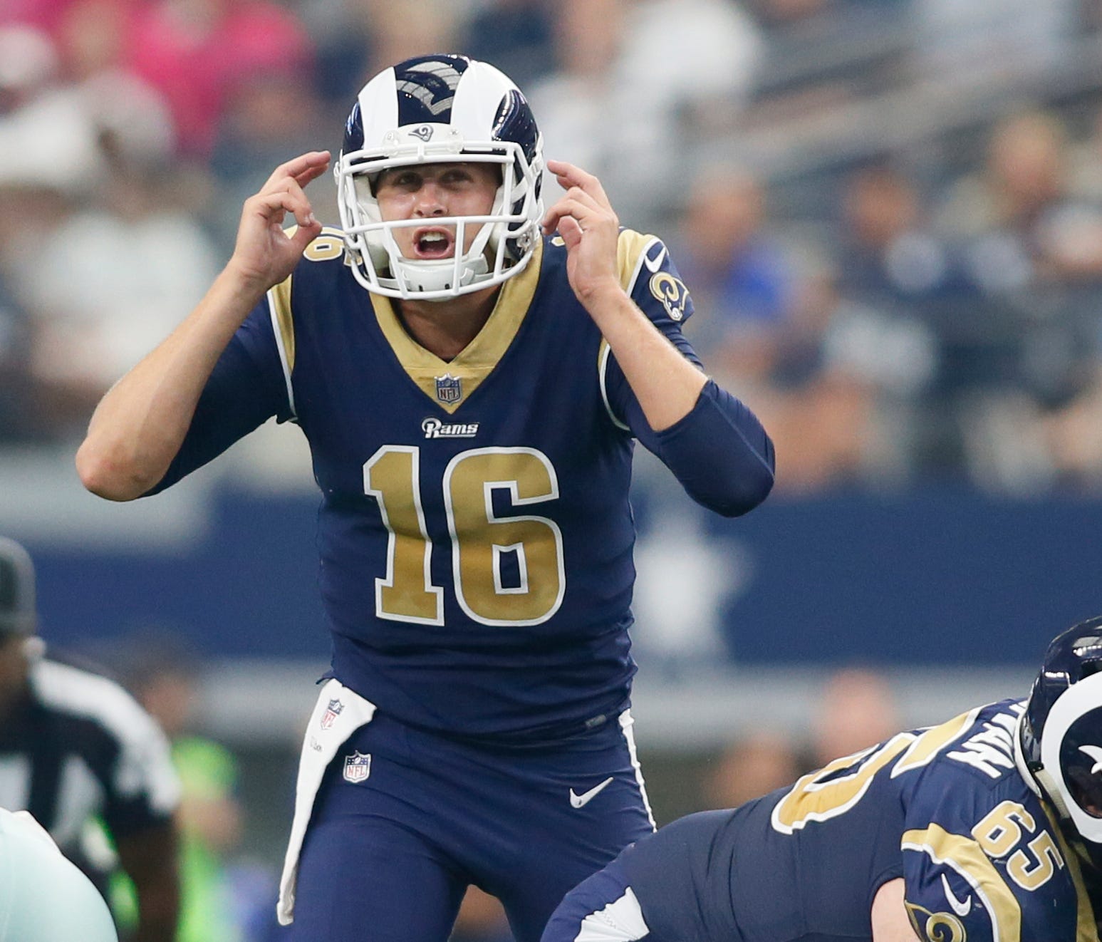 Los Angeles Rams quarterback Jared Goff (16) calls a play in the fourth quarter against the Dallas Cowboys at AT&T Stadium.