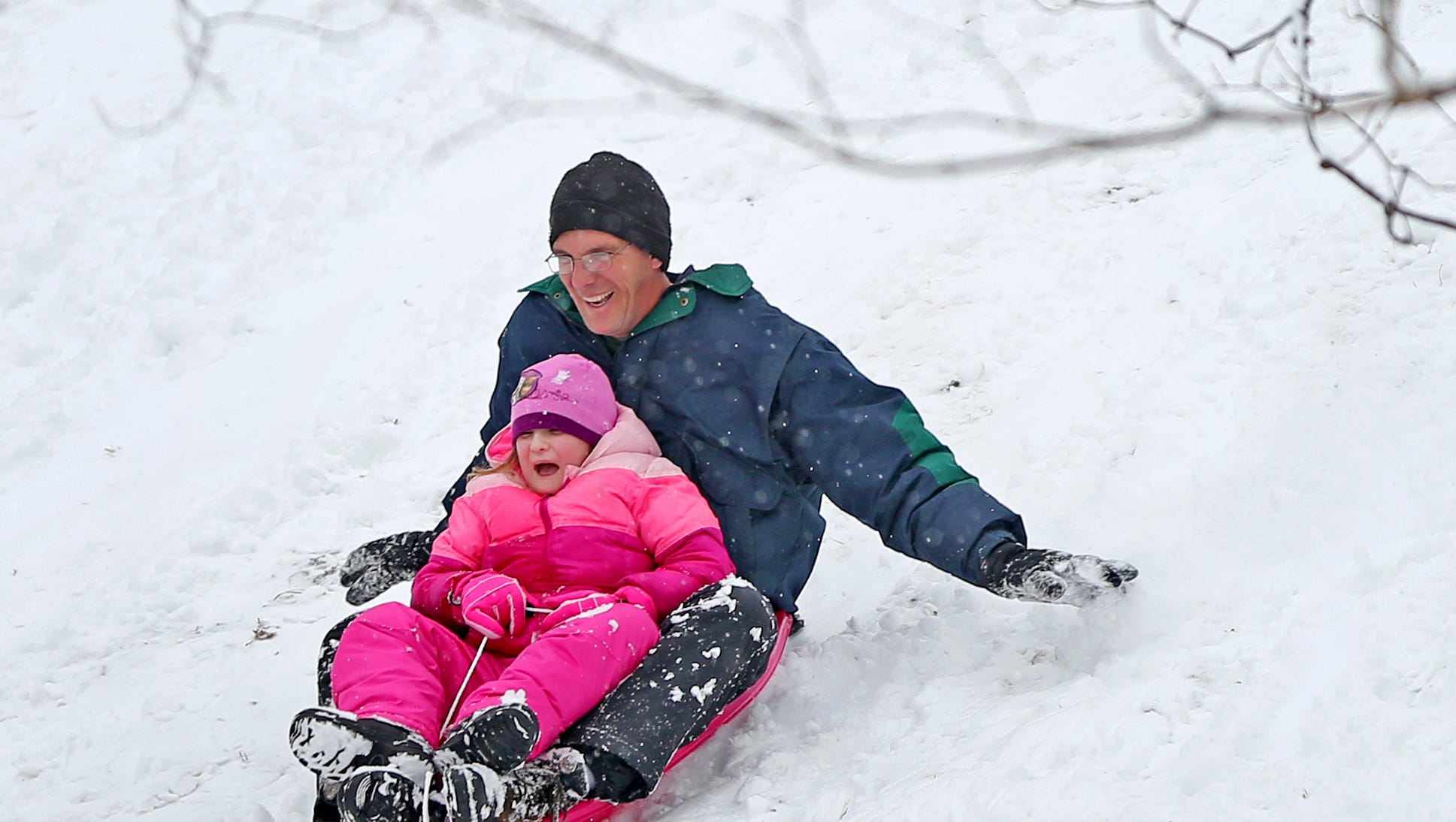 When Life Brings Snow Indy Residents Make Snowballs