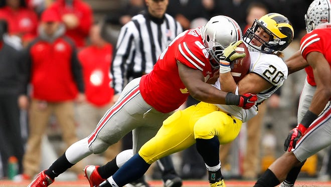 Michigan Can T Finish Falls 42 28 To Rival Ohio State Michigan Can T Finish Falls 42 28 To Rival Ohio State