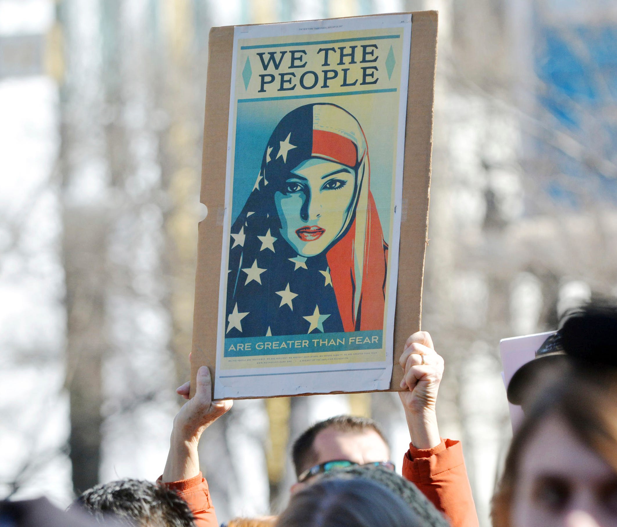 Hundreds of people gathered in Durham, N.C., on Friday to show their support for refugees and immigrants and stand against President Trump's immigrant ban.