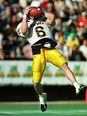 Tim Dwight's 32-yard pass reception in the third quarter was one of the few bright spots for the Hawkeye senior. He was double- and triple-teamed by Arizona State during much of the Sun Bowl on Dec. 31, 1997, in El Paso, Texas. He had three receptions for 51 yards.