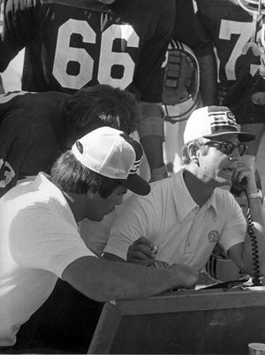 Rich Johanningmeier, right, won 58 games in 10 seasons coaching the Bears from 1976-1985.