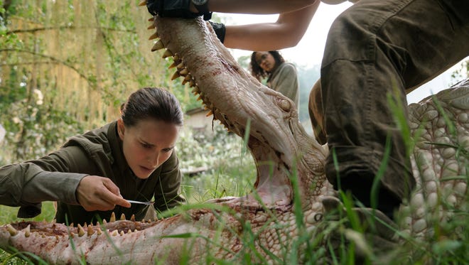 A biologist (Natalie Portman) investigates a mutated alligator in "Annihilation."