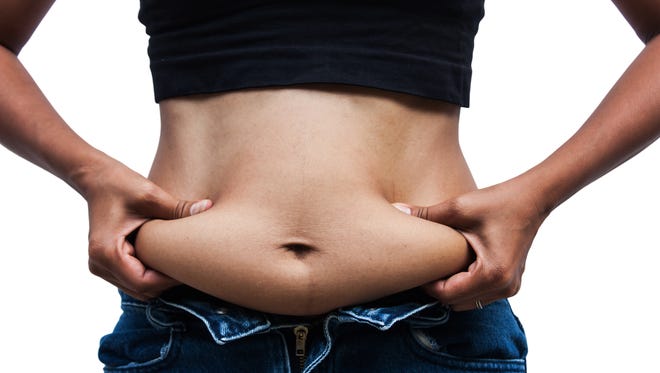 Body fat, especially belly fat, is a more important health indicator than weight, experts say.
