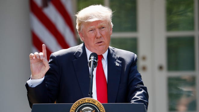 In this Thursday, June 1, 2017 file photo, President Donald Trump speaks about the U.S. role in the Paris climate change accord in the Rose Garden of the White House in Washington. The Trump Administration is officially telling the United Nations that the U.S. intends to pull out of the 2015 Paris climate agreement.