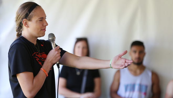 Oregon State's Sydney Wiese speaks to youth during Hoopla festivities on Friday, Aug. 5, 2016, at the Oregon State Capitol in Salem. Festivities included Hoopla Hoop Camp and the CT Studd 4x4 tournament benefiting Salem Young Life.