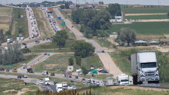 Heavy traffic flows on Interstate 25 near Berthoud on Friday, June 30, 2017.
