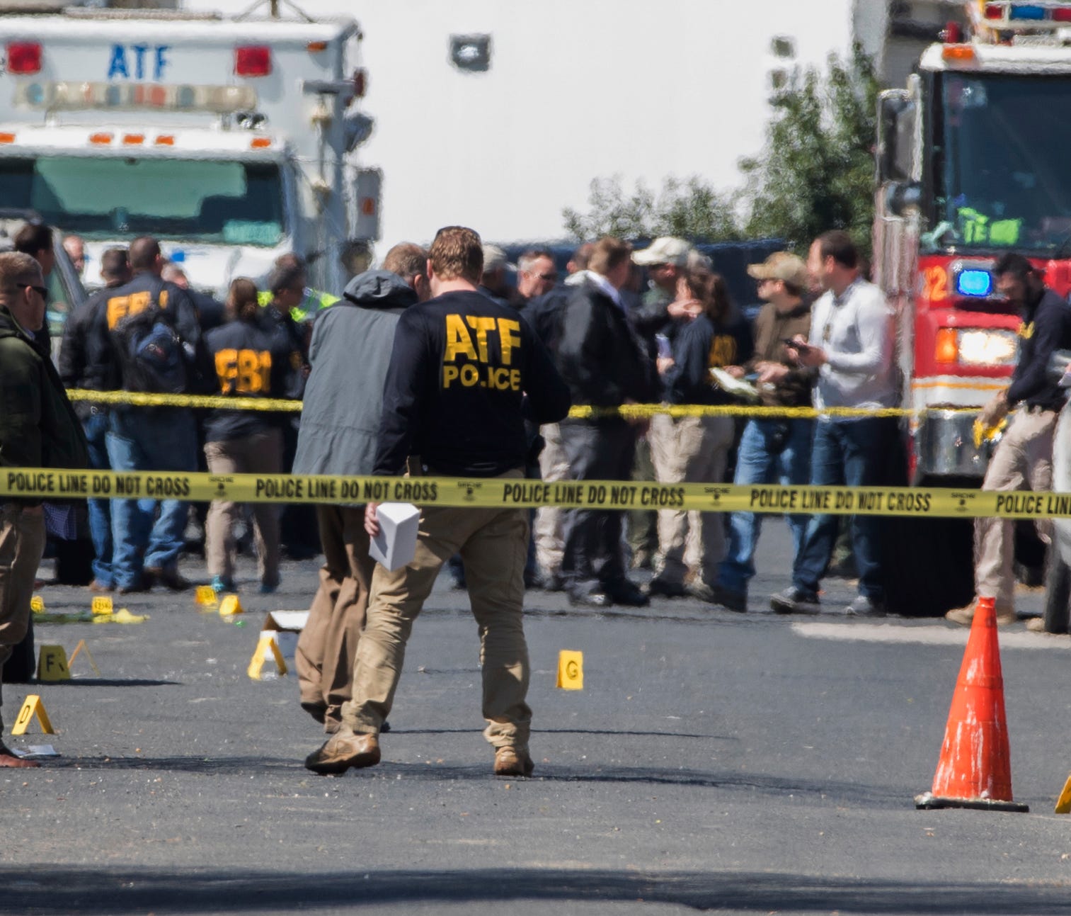Authorities investigate an explosion at a home in Austin, Texas, on March 12, 2018. Investigators believe two explosions on Monday are linked to another deadly bombing elsewhere in the city this month, and they're considering whether race was a facto