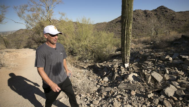 ASU head basketball coach Bobby Hurley hikes in the McDowell Mountains in Scottsdale on July 3, 2018. Since moving to the Valley when Hurley became ASU head basketball coach in 2015, hiking in the desert has become a regular part of his exercise routine.