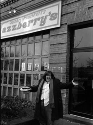 In this circa 1980s photo, Susan Plunkett poses outside Jazzberry’s when it was on Monroe Avenue.