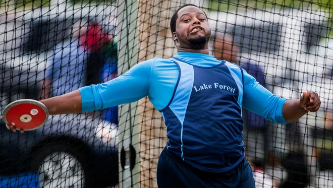 Lake Forest's Jamar Brown throws for a first place finish in the Division II Boys Discus event at the DIAA Outdoor Track and Field Championships at Dover High School in Dover on Monday evening.