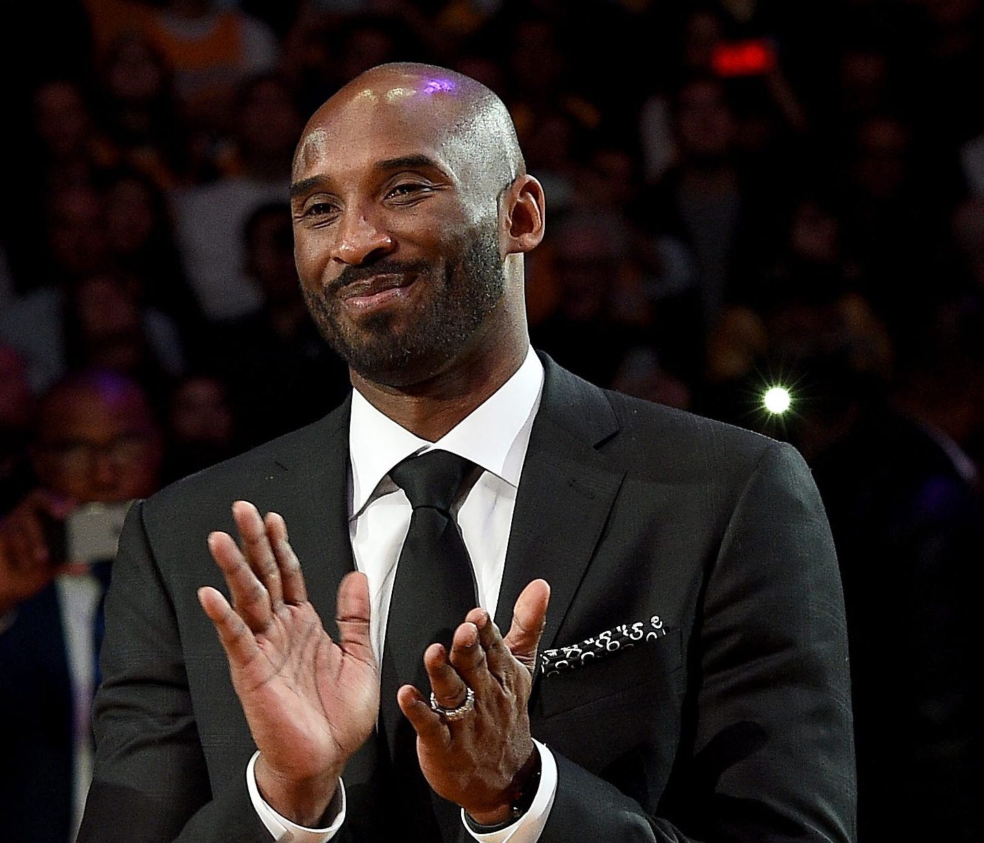 LOS ANGELES, CA - DECEMBER 18:  Kobe Bryant smiles at halftime as both his #8 and #24 Los Angeles Lakers jerseys are retired at Staples Center on December 18, 2017 in Los Angeles, California. NOTE TO USER: User expressly acknowledges and agrees that,