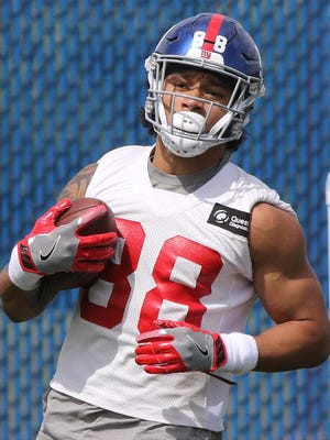 The Giants first round draft pick Evan Engram after making a catch.