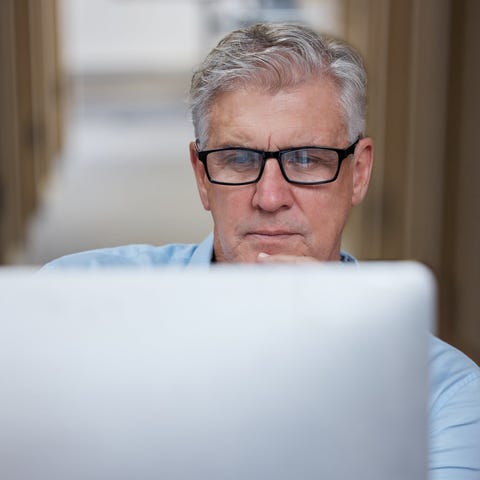 A person at a laptop.