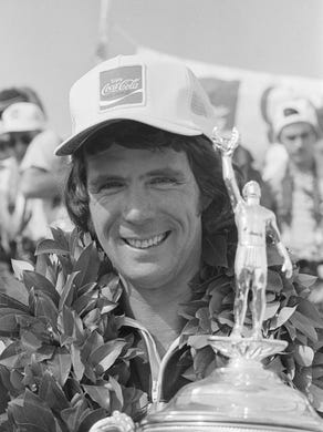 Darrell Waltrip is all smiles wearing a victor's garland