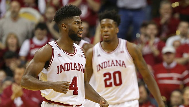 IU is expected to host Indiana State next season. Robert Johnson (4) and De'Ron Davis (20) are among a number of IU players to stick around Bloomington this summer.