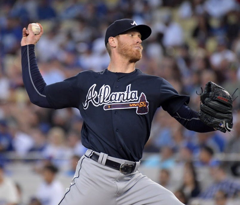 Atlanta Braves pitcher Mike Foltynewicz (26) throws the ball against the Los Angeles Dodgers during the first inning at Dodger Stadium.
