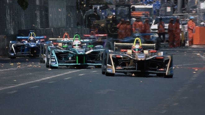 A pack of E cars heads for the straightaway.