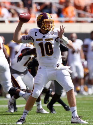 Central Michigan quarterback Cooper Rush throws a pass during the first half of an NCAA college football game against Oklahoma St in Stillwater, Okla., Saturday, Sept. 10, 2016.