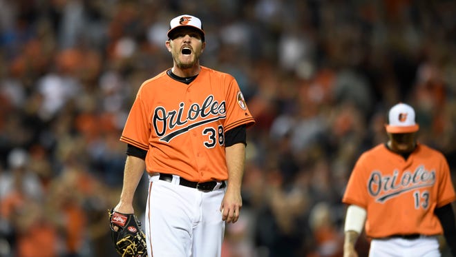 Baltimore Orioles starting pitcher Wade Miley reacts after giving up a hit to the Arizona Diamondbacks in the ninth inning of a baseball game, Saturday, Sept.24, 2016, in Baltimore. The Orioles won 6-1.