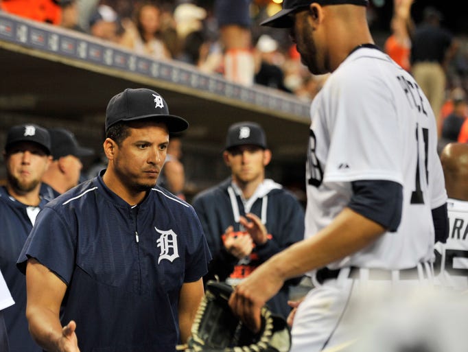 Tigers designated hitter Victor Martinez congratulates