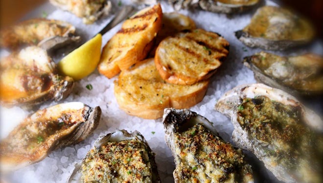 The oyster sampler at Half Shell Oyster House includes four varieties of the restaurant's specialty.