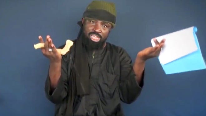 Boko Haram leader Abubakar Shekau makes a statement at an undisclosed location in this screengrab taken from video on Feb. 18, 2015.