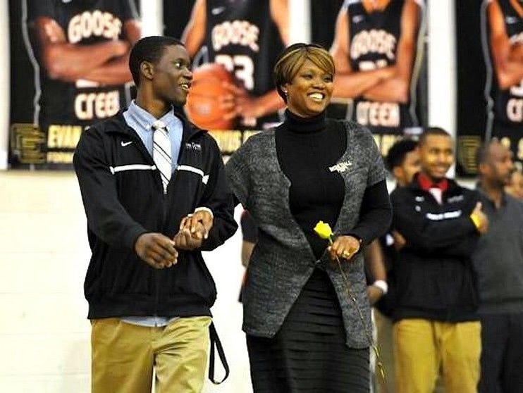 Sharonda Coleman-Singleton and her son Chris at Goose Creek High School, where she taught.