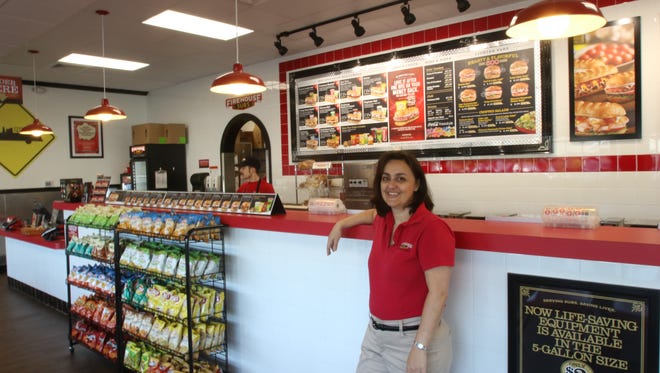 Jennifer Roland is co-owner and general manager of the new Firehouse Subs store in South Salem.