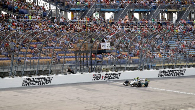 Josef Newgarden races his car during the IndyCar Series auto race Sunday, July 10, 2016, at Iowa Speedway in Newton, Iowa.