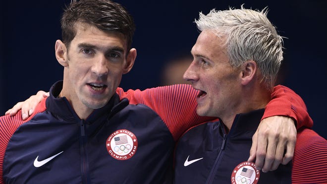 Rivals Michael Phelps, left, and Ryan Lochte go 1-2 in Thursday's 200 IM final.