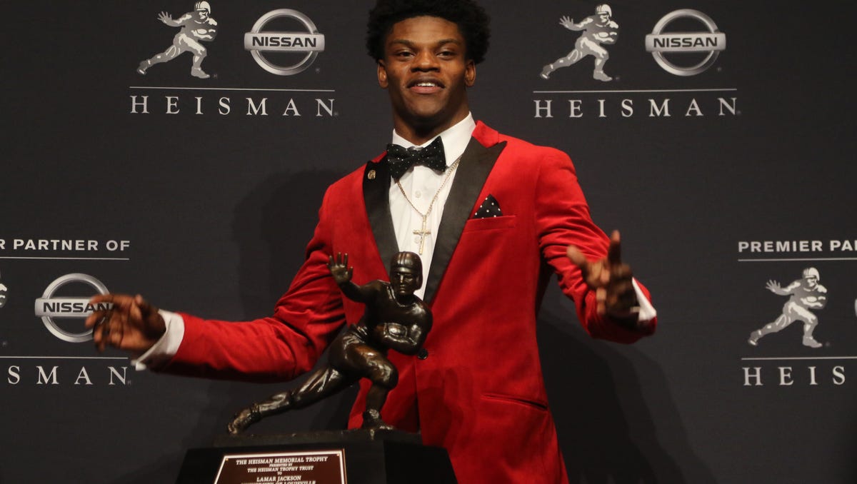 Photos Lamar Jackson Of Louisville Wins The Heisman Trophy