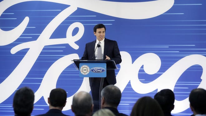 Ford President and CEO Mark Fields addresses the Flat Rock Assembly Tuesday, Jan. 3, 2017, in Flat Rock, Mich. Ford is canceling plans to build a new $1.6 billion factory in Mexico and will invest $700 million in a Michigan plant to build new electric and autonomous vehicles. The factory will get 700 new jobs. (AP Photo/Carlos Osorio)