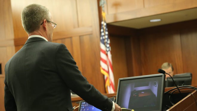 Washington County Attorney Brock Belnap cues up video of a 2010 police interview in which murder suspect Brandon Perry Smith discusses the events that led to the death of Leeds resident Jerrica Christensen, St. George resident Brandie Jerden, and the non-fatal shooting of their mutual acquaintance James Fiske at the downtown home of Smith's codefendant, Paul Ashton. The prosecution rested its case Thursday and Smith's defense will begin calling testimony Friday.