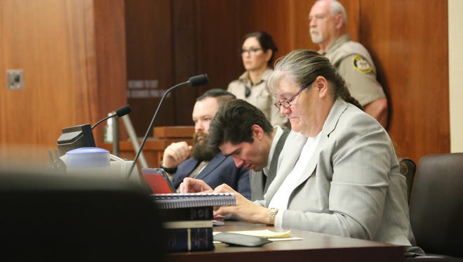 Aggravated murder defendant Brandon Perry Smith, second from right, reddens as he listens to closing arguments Thursday about the slaying of 20-year-old Jerrica Christensen and what his attorney called "different" character traits that affected his response to other people's expectations of him in St. George's 5th District Court.