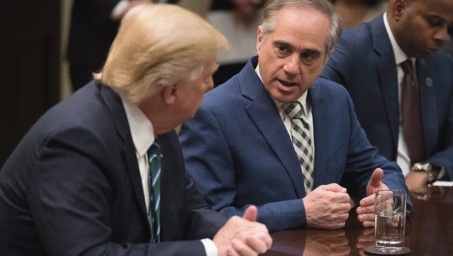 President Trump listens to VA Secretary David Shulkin during a meeting about veterans' affairs at the White House on March 17.